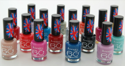 Different colours of Rimmel nail polish ona flat surface