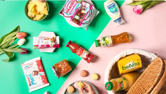 An unboxed Degusta Box with different snack and pantry items
