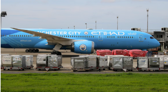 An Etihad Airways loading cargo at a Manchester airport