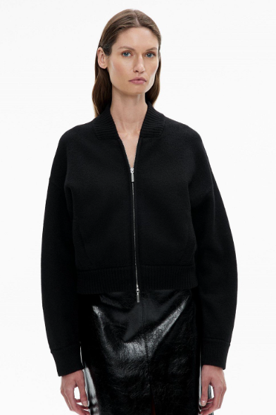 Women's coats and jackets: A model wearing a black wool knit bomber