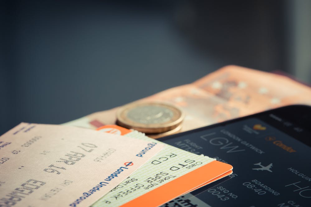 Best Black Friday deals: Flight tickets on a table with money in the background