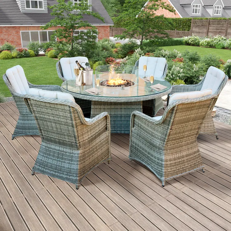 glasstop outdoor roundtable with 6 chairs around and a green garden in the background