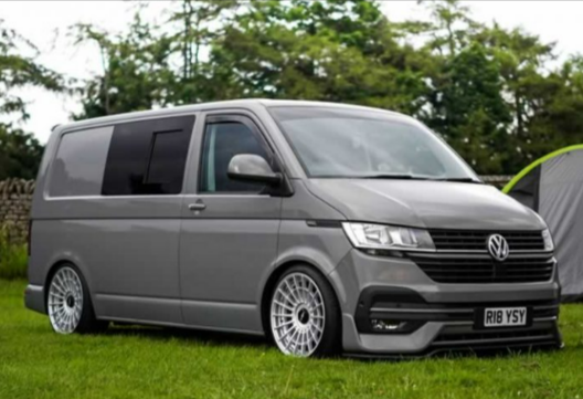 A VW camper modified with products from Butler Technik on a camping trip