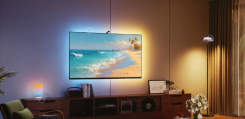 Govee smart TV backlight creates colourful lighting around a wall-mounted TV