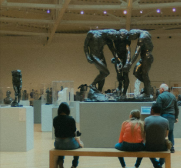 Contemporary art museum with visitors and sculptures