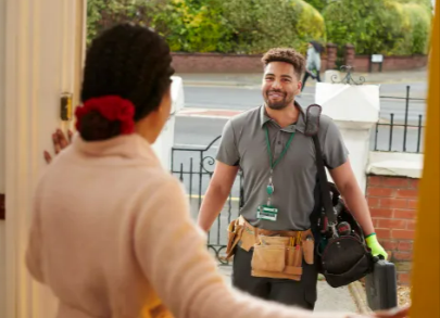 A lady greeting a handyman at her house