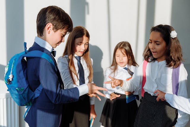 Getting ready for back to school: A group of children wearing school uniforms