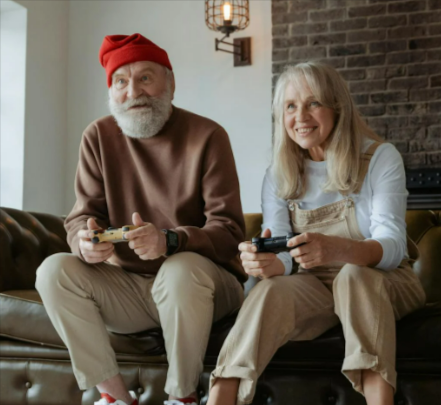 Man and woman sitting on brown leather couch