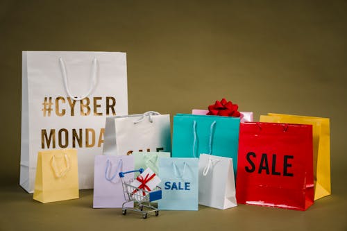 A bunch of shopping bags saying Cyber Monday Sale