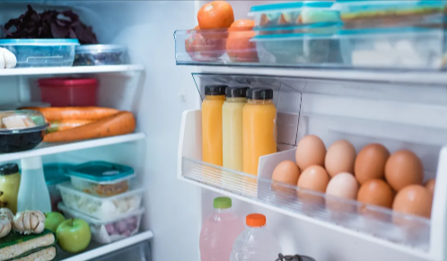 A fridge from KDH Electrical stocked with groceries