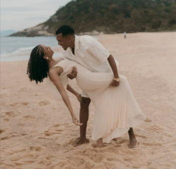 Black couple on a holiday on a beach