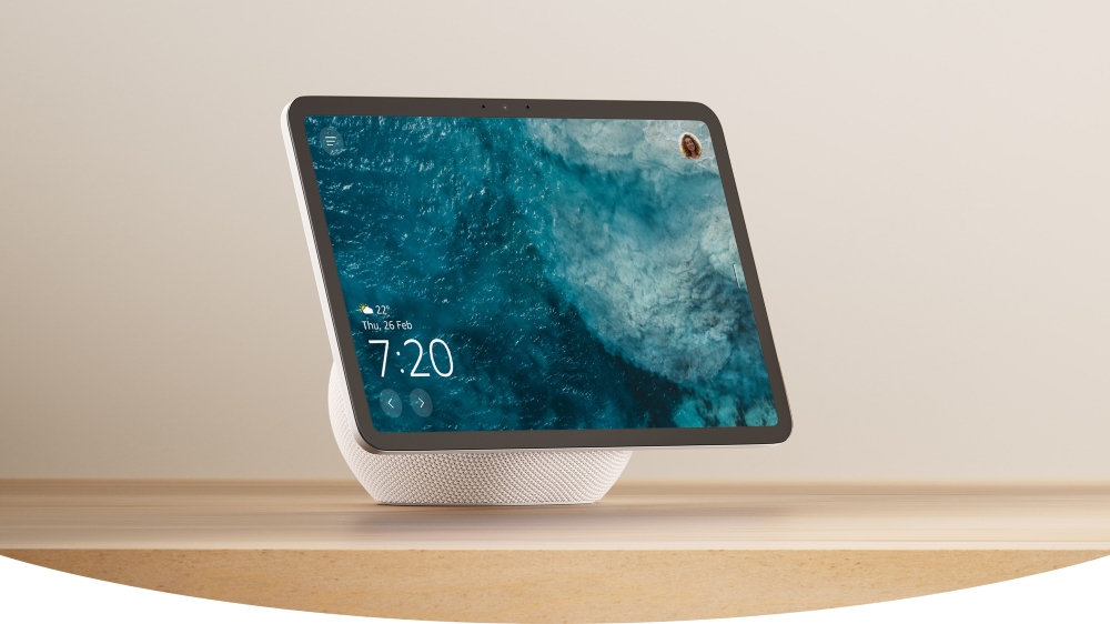 An Amazon Echo Show 11 resting on a beige quartz countertop