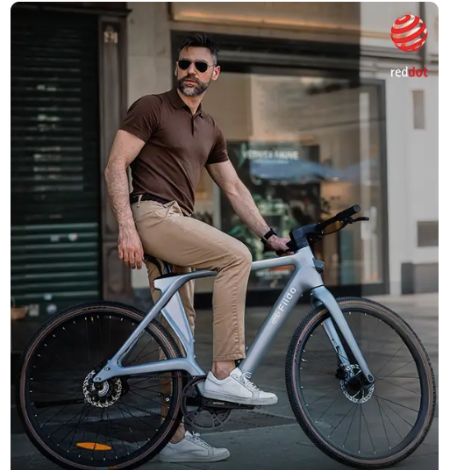 A man seated on his e-bike, as he gets ready to cyle away