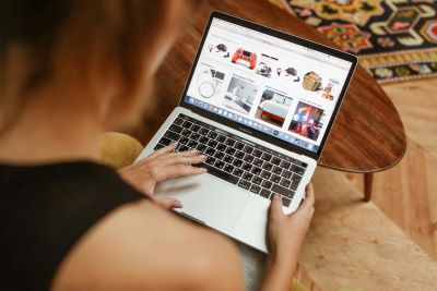 a young woman shopping on Black Friday for new gaming tools