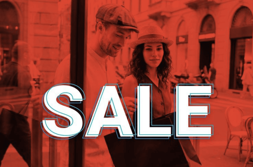 Hatshopping voucher code: The word ‘Sale’ over a red background with people shopping