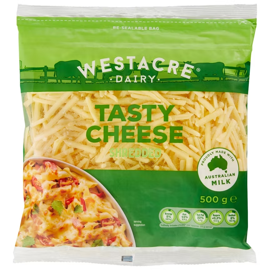 A bag of Westacre tasty grated cheese on a white background