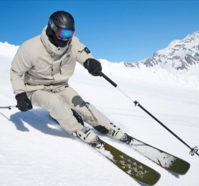 A person wearing a Dare 2b Eagle III Ski Jacket and the Dare 2b Effused II Ski Pants while skiing