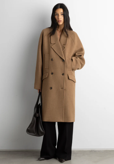 Best coats for fall: A model wearing the Oversized Wool-blend Double-breasted Coat