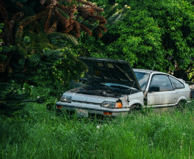 A car waiting to be towed away after going off road