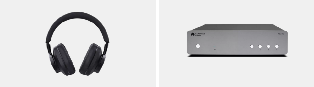 black headphones and a silver audio system on a white background