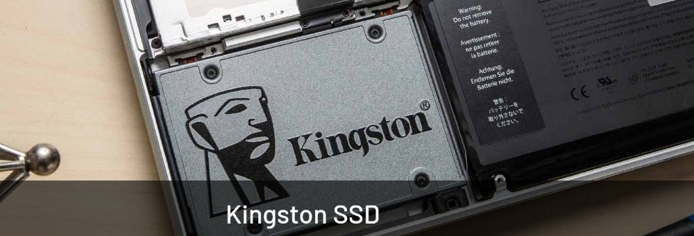 BuyKingston SSD card atthe back of a small silver computer