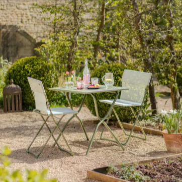 Moss green balcony table and two chairs set from the Graham and Green garden furniture section.