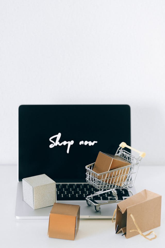 A laptop with the words Shop Now on it