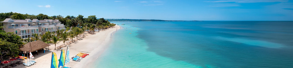 View of Beaches Resorts' Negril resort showing hotel along shoreline