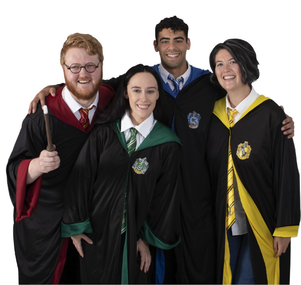 Family Halloween costume ideas: Four adults wearing robes and holding wands
