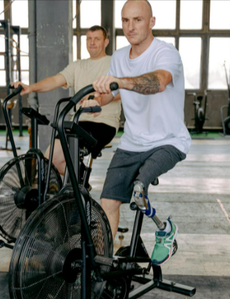A man using a stationary bicycle from FitKit