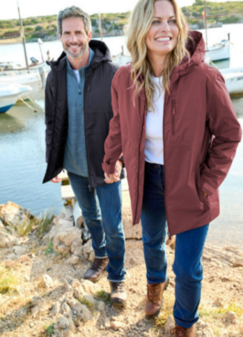 A couple wearing the Cotton Traders quilt lined waterproof jacket