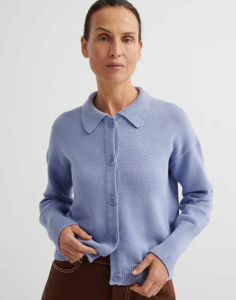 Women's knitwear (NZ): A model wearing the periwinkle Kowtow Utility Cardigan