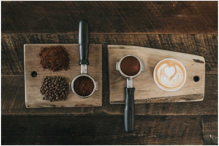 Coffee beans and powdered coffee, with coffee and milk